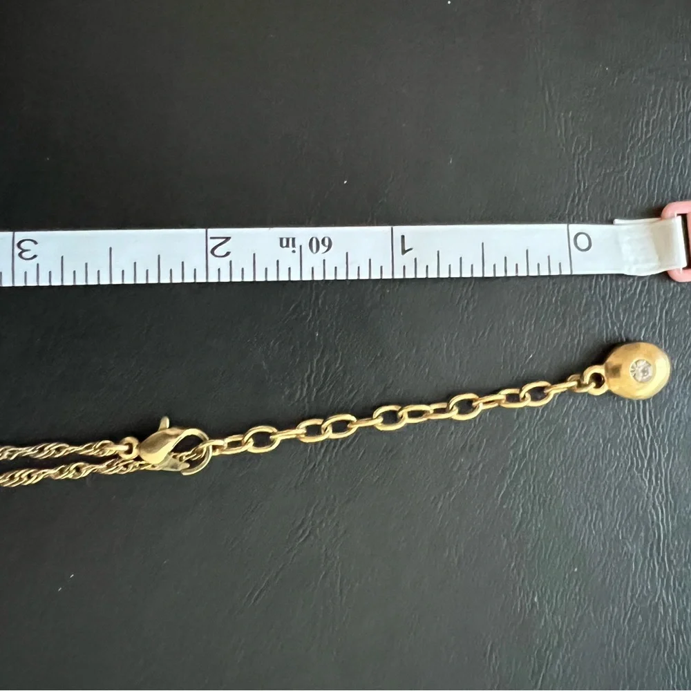NECKLACE of GOLD TONE FILIGREE WITH RHINESTONES A TWISTED CHAIN AND EXTENSION